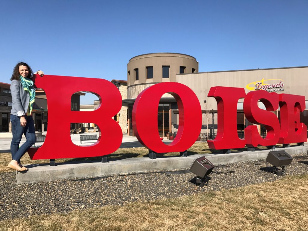 Woman and Boise Idaho Sign